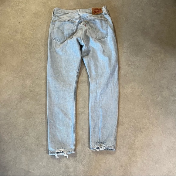 Levi's 501 Light Blue Denim Jeans. Button fly. Rips. Size 27. Leg 28. Like new - Picture 9 of 9
